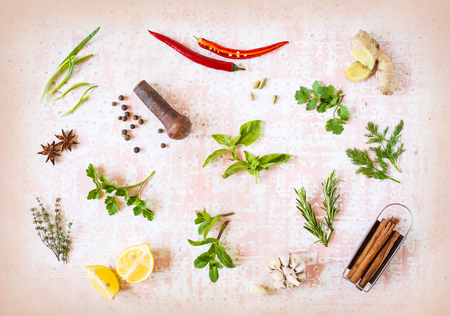 Colorful herbs and spices for cooking food on old vintageの写真素材