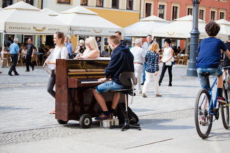 Wroclaw Poland - May 20, 2018: A young guy playing the piano on the square at the Town Hall of Wroclawのeditorial素材