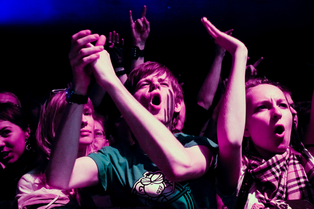 Chelyabinsk Russia - April 22, 2012: Concert of the German rock band Scorpions in the Palace of Sports "Yunost". In the photo: the fans of the group in the auditoriumのeditorial素材