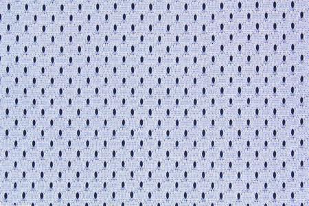 White nylon mesh perforated fabric sport clothing texture on black background. Seamless synthetic...