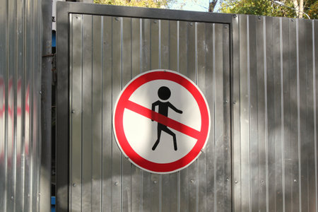 Prohibited symbol No entry Not allowed. Forbidden round warning sign. Safety notice on closed metal...