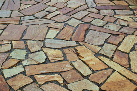 Cobblestone walkway texture. Abstract background and texture for design.