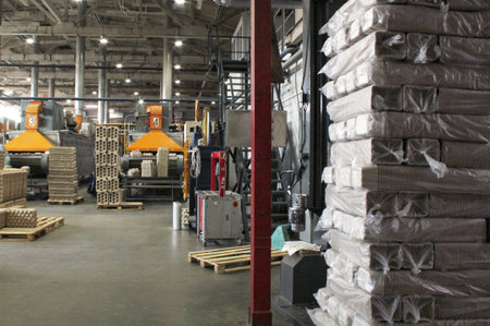 Interior of a warehouse with boxes and boxes on a palletのeditorial素材