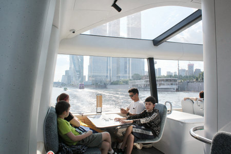 Passengers on a board of aquabus boat on Moskva River. electrical ship. Ecological public transport....