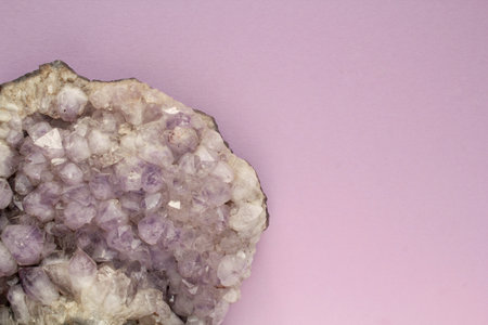 Natural violet amethyst druse geode mineral crystal polished semi-precious gemstone on purple background. Magic rock for witchcraft, spiritual practice, meditation. Esoteric life bの写真素材