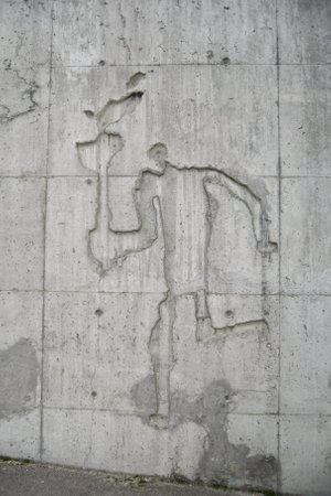 Silhouette of torchbearer athlete running with sport torch on stone wall olympic stadium Lysgardsbakken. Lillehammer, Norway - August 24, 2008のeditorial素材