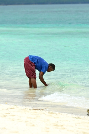 nzibar Tanzania Africa August 2016 fisherman on Nungwi Beach in Zanzibar Islandのeditorial素材