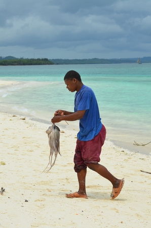 nzibar Tanzania Africa August 2016 fisherman on Nungwi Beach in Zanzibar Islandのeditorial素材