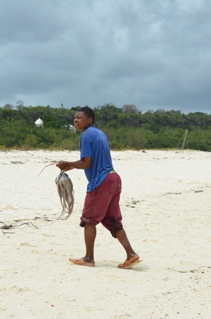 nzibar Tanzania Africa August 2016 fisherman on Nungwi Beach in Zanzibar Islandのeditorial素材