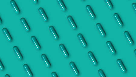 Green background or banner with pattern of capsules. High quality photo