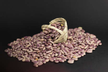 Beans with Mexican palm basket. High quality photo
