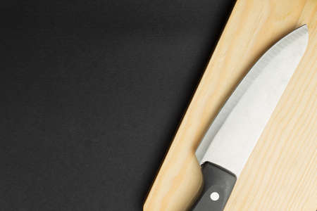 Knife with minimalist cutting board. High quality photoの写真素材