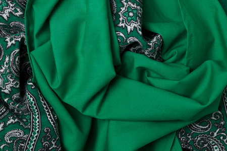 Texture of green fabrics, handkerchief and paliacate. High quality photoの写真素材