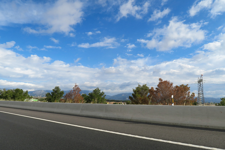 road street with blue skyの写真素材