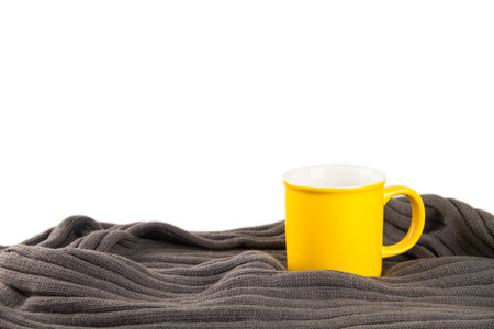yellow cup with scarfの写真素材
