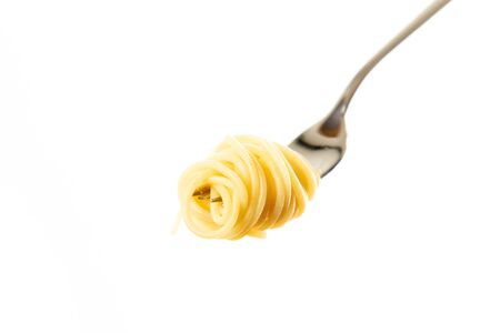 spaghetti spaghetti on a fork isolated with a white backgroundの写真素材