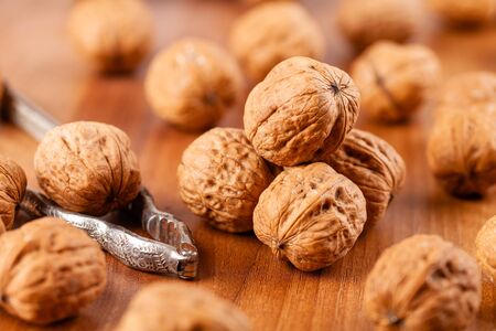 walnut on a brown wooden background