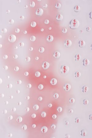 red dollar sign reflected in multitude of  dropletsの写真素材