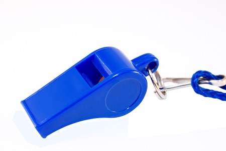 blue whistle isolated on whiteの写真素材