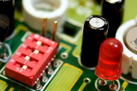 closeup of some electronic components inside a security system and burglar alarm device