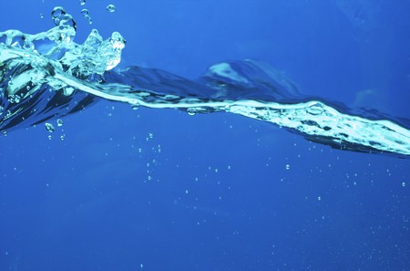 Fresh water with waves and bubbles