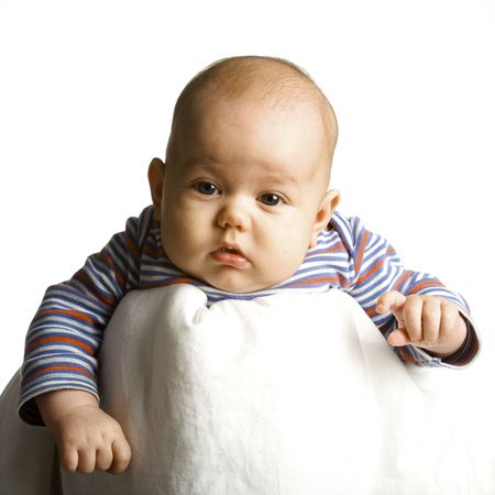 The boy at the age of 3 months on a white backgroundの写真素材