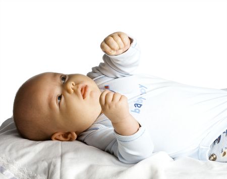 The boy at the age of 3 months on a white backgroundの写真素材