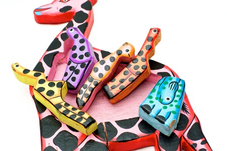 Wooden toy giraffe on white backgroundの写真素材