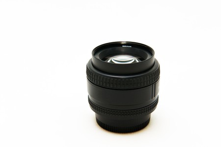 Black camera lens isolated on whiteの写真素材