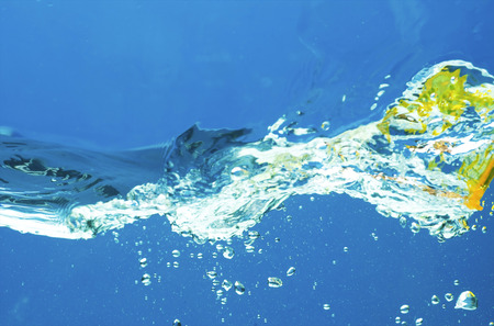 Fresh water with waves and bubblesの写真素材