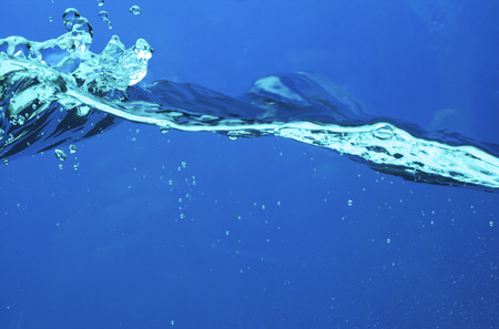 Fresh water with waves and bubblesの写真素材