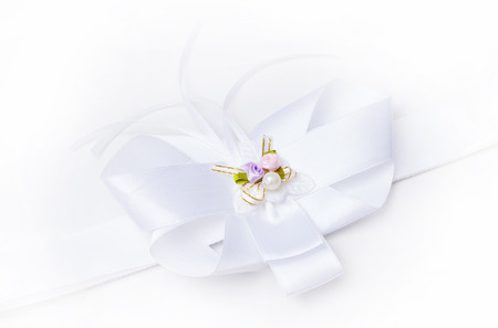gift ribbon and bow isolated over whiteの写真素材