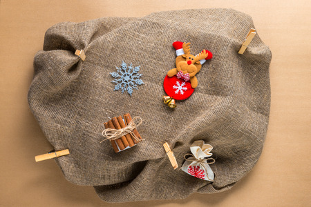 Christmas decoration on natural sackcloth backgroundの写真素材