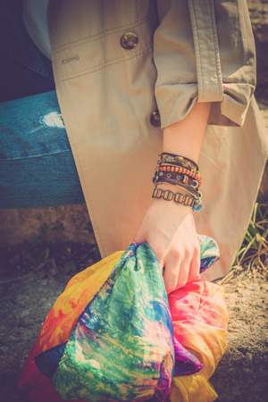 Fashion shot of a beautiful boho style girl on nature background. Boho, hippie.の写真素材