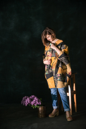 Portrait of beautiful young hippie woman in studio. Boho style.の写真素材
