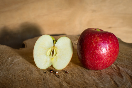 Fresh red apples on a wooden backgroundの写真素材