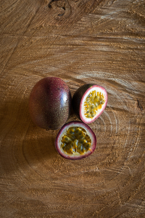 Juicy of Passion Fruit on wooden backgroundの写真素材