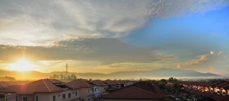 malaysia cityscape at sunrise with mountain backgroundの写真素材
