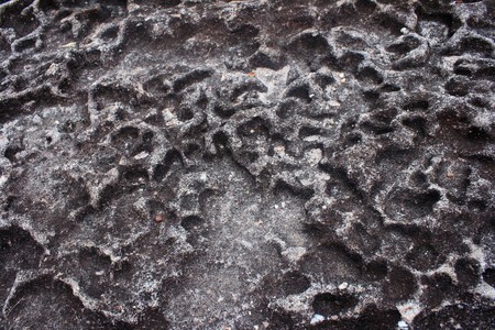 Grey stone background with vignette or textureの写真素材