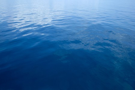 Background of calm dark blue seaの写真素材