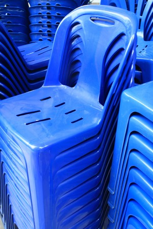 Lot plastic blue chair backgroundの写真素材