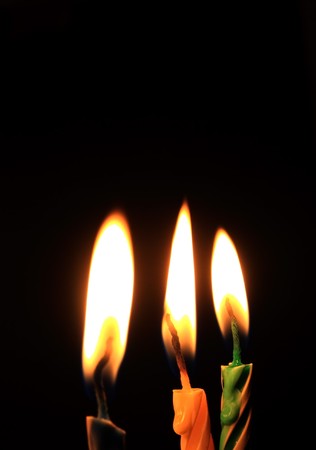 Candles isolated on black backgroundの写真素材