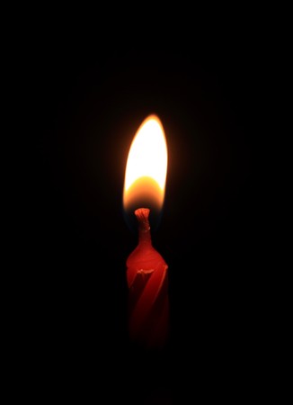Candles isolated on black backgroundの写真素材