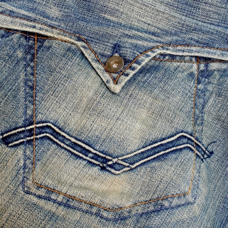 closeup of blue jeans pocketの写真素材