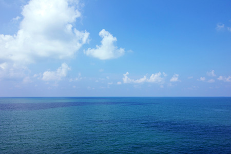 Background of calm sea and blue skyの写真素材