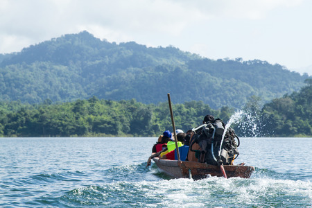 Lake mountain with boat and blue sky