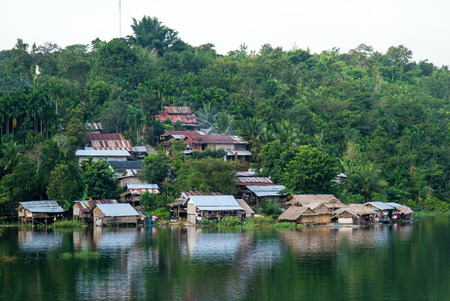 Village on mountain and riverside in countryside Thailandの写真素材