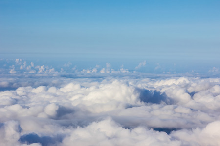 Soft clouds over view from airplane flyingの写真素材