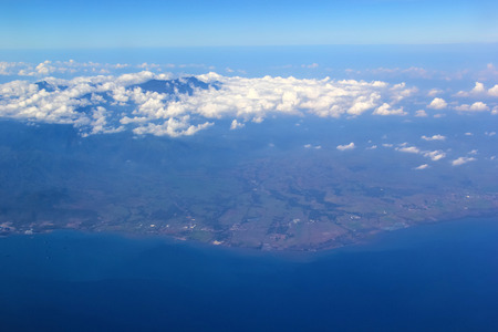Soft clouds over view from airplane flyingの写真素材