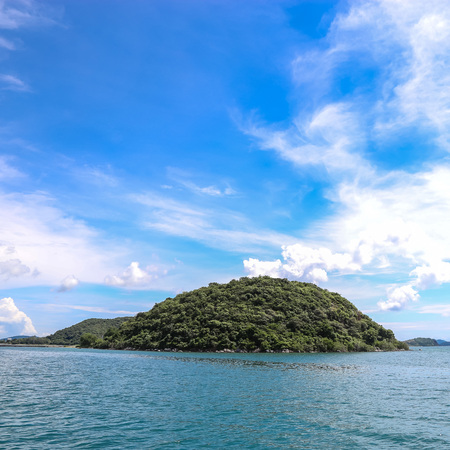 Island on sea with cloud and skyの写真素材